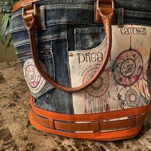 Very spacious like new denim bag